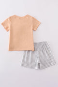 Orange floral bunny applique set with playful patterns, perfect for spring outings.