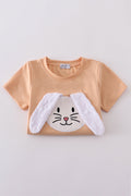 Orange floral bunny applique set with playful patterns, perfect for spring outings.