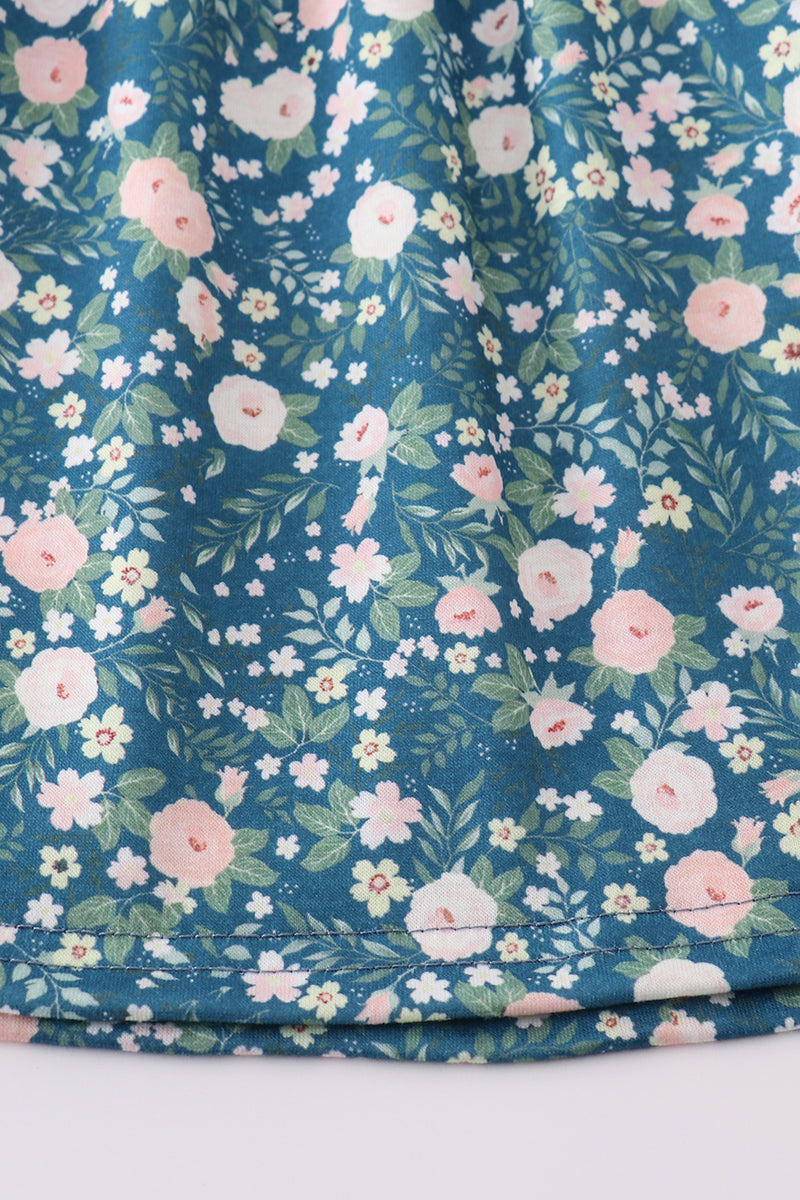 Green floral dress with a cute bunny applique, perfect for spring outings.