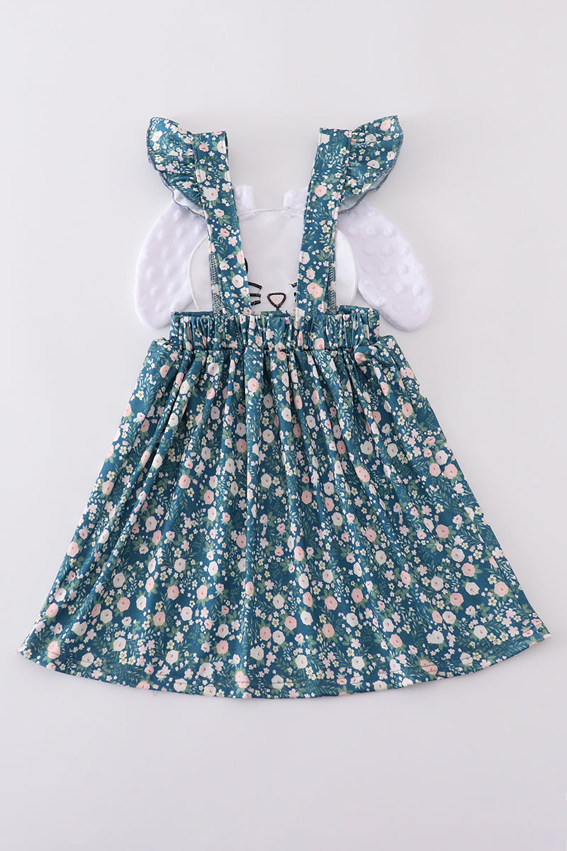 Green floral dress with a cute bunny applique, perfect for spring outings.