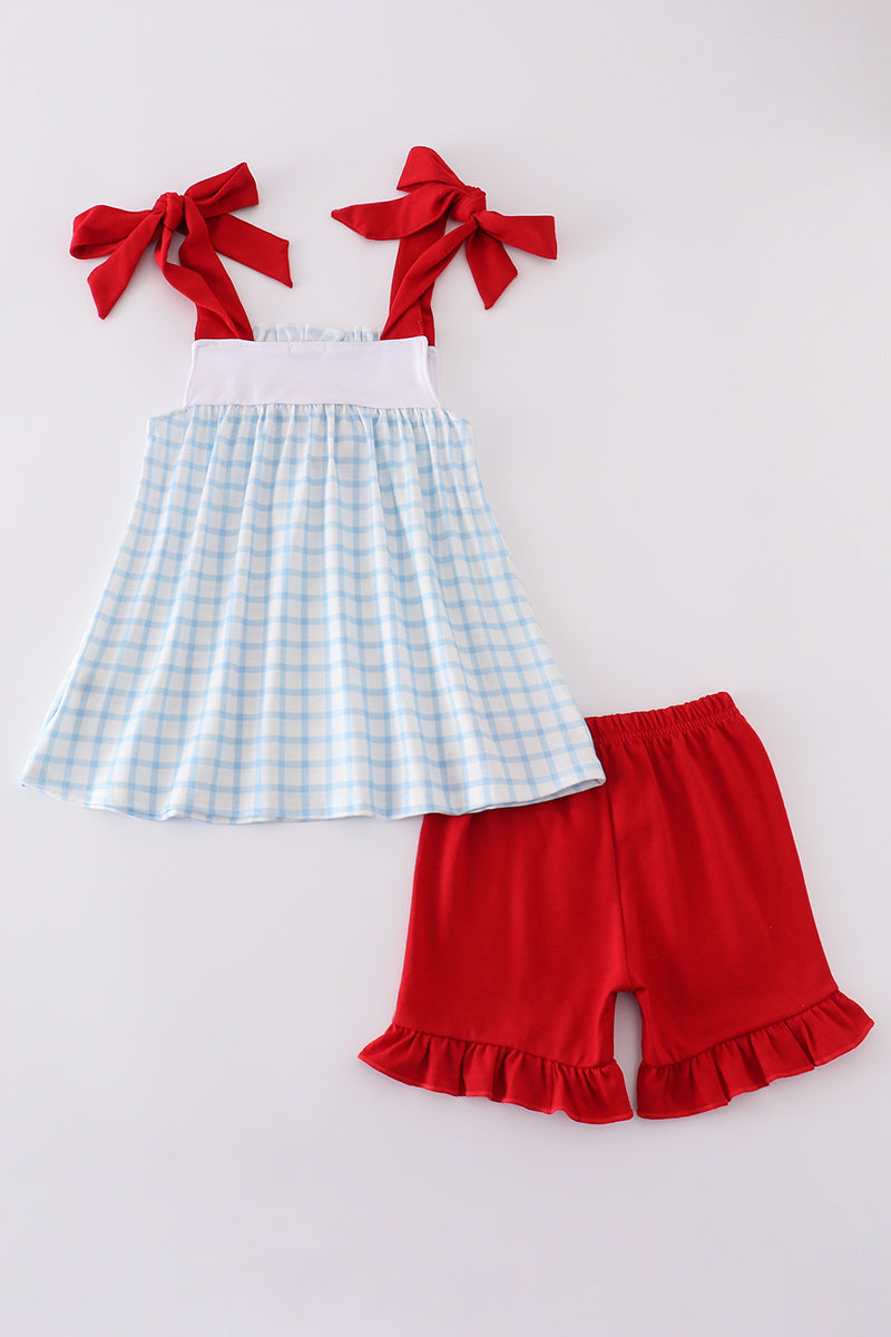 Blue flag embroidery set: cozy children's outfit with playful flag patterns.