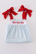 Blue flag embroidery set: cozy children's outfit with playful flag patterns.
