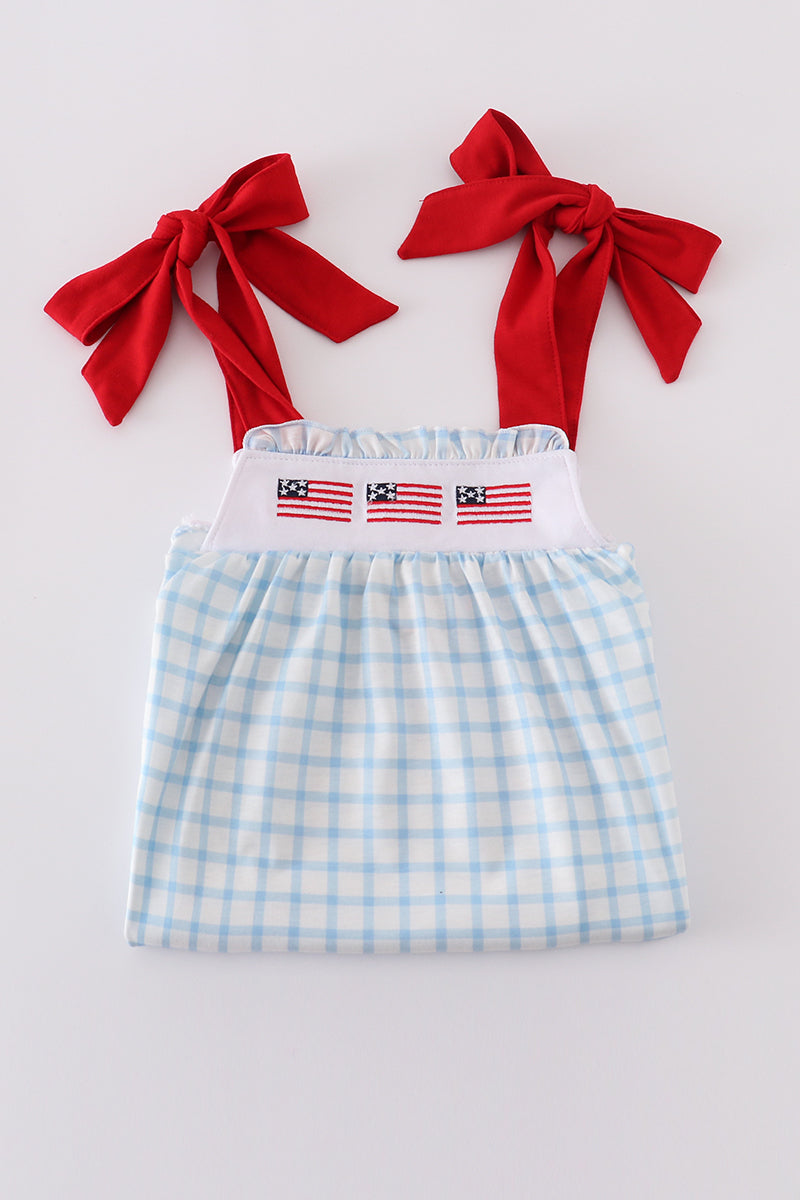 Blue flag embroidery set: cozy children's outfit with playful flag patterns.