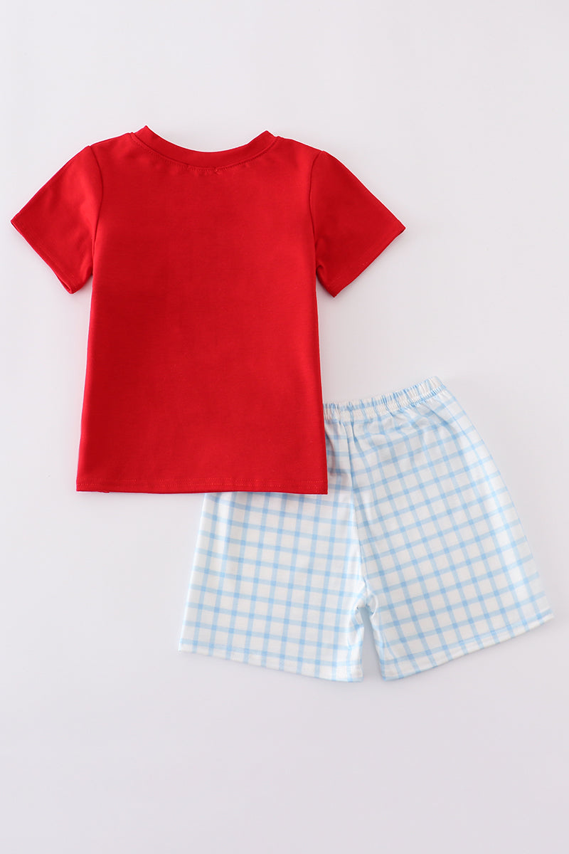 Children's blue flag embroidery set: cozy top and pants with playful flag patterns.