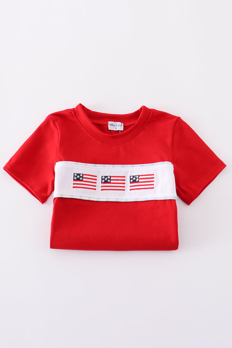 Children's blue flag embroidery set: cozy top and pants with playful flag patterns.