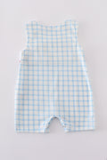 Blue jonjon with charming flag embroidery, perfect for playful summer adventures.