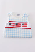 Blue jonjon with charming flag embroidery, perfect for playful summer adventures.