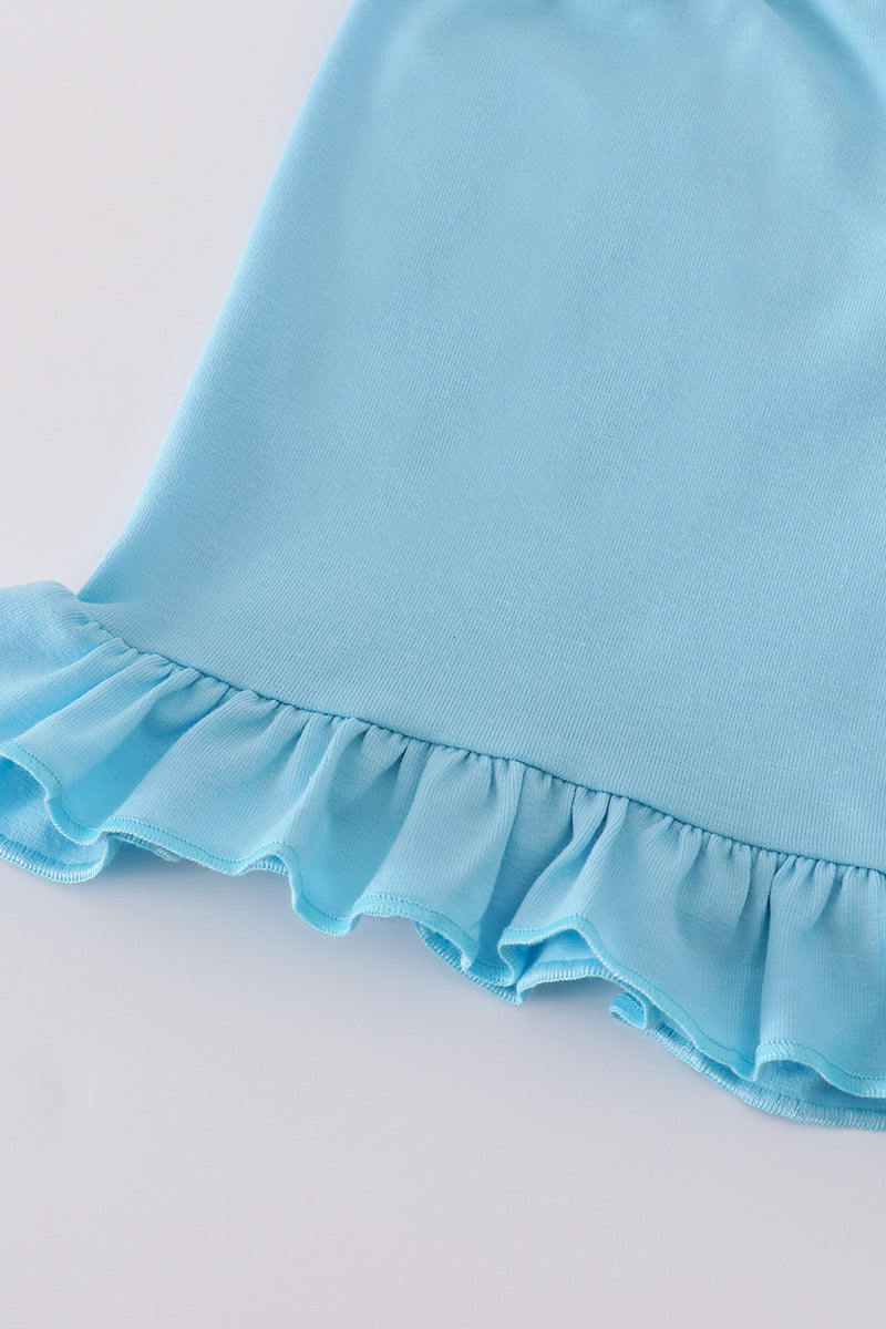 White smocked set with starfish embroidery, perfect for beach outings.