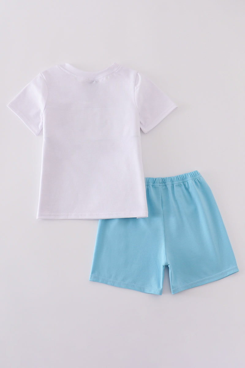 White smocked set with starfish embroidery, perfect for summer beach outings.