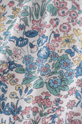 Vintage meadow print bow shorts set with floral pattern, perfect for playful summer days.