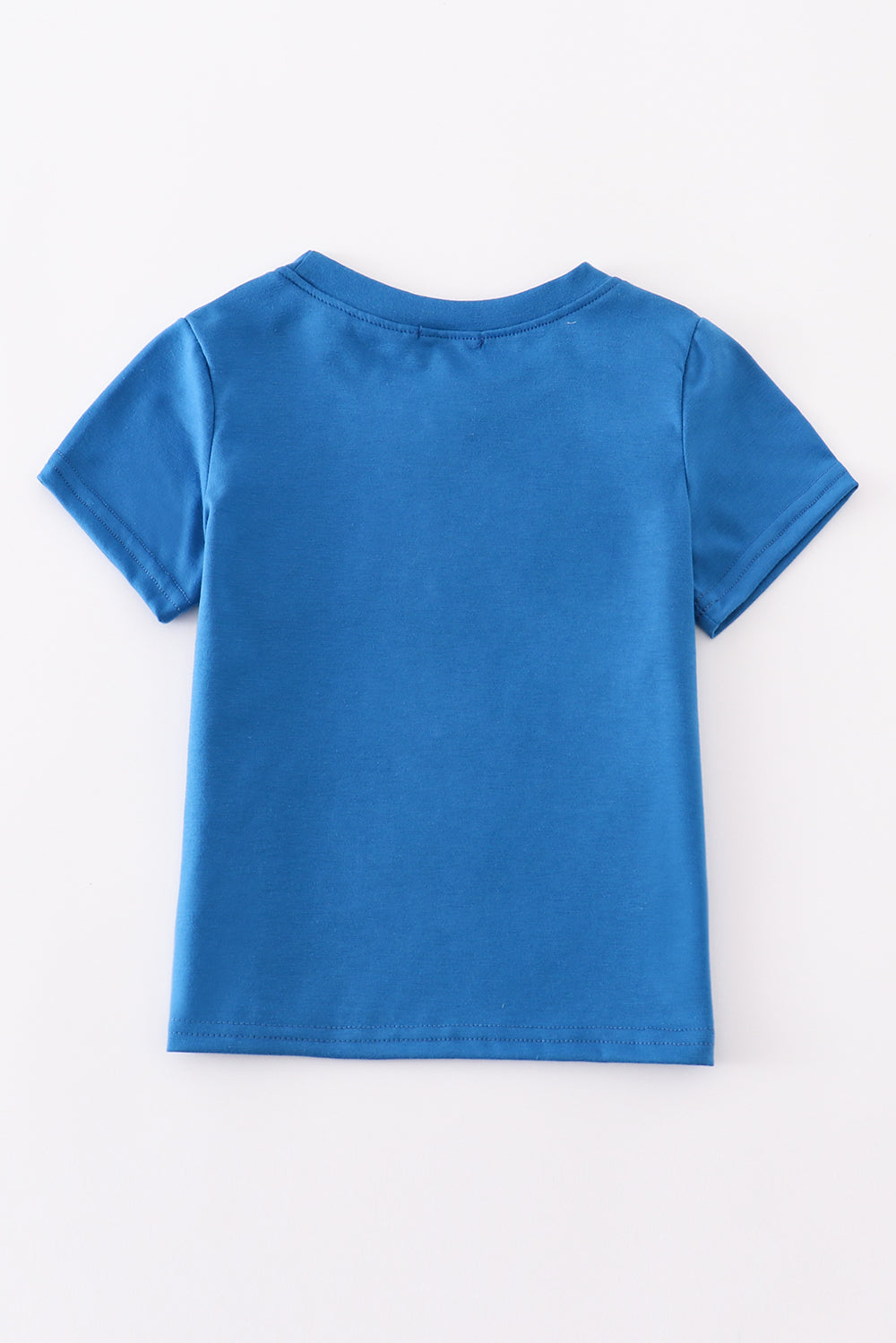 Blue top with playful airplane embroidery, perfect for kids' adventures.