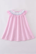 Pink seersucker dress with playful animal embroidery, perfect for spring outings.