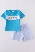 Blue seersucker set with playful animal embroidery, perfect for kids' summer adventures.