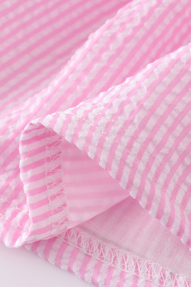 Pink seersucker bloomer set with cross floral embroidery, perfect for spring outings.