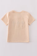 Cream top with delicate cross-stitch knots, perfect for everyday play.