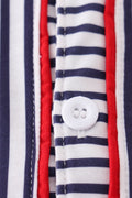 Children's baseball-themed outfit with colorful stripes and playful embroidery.