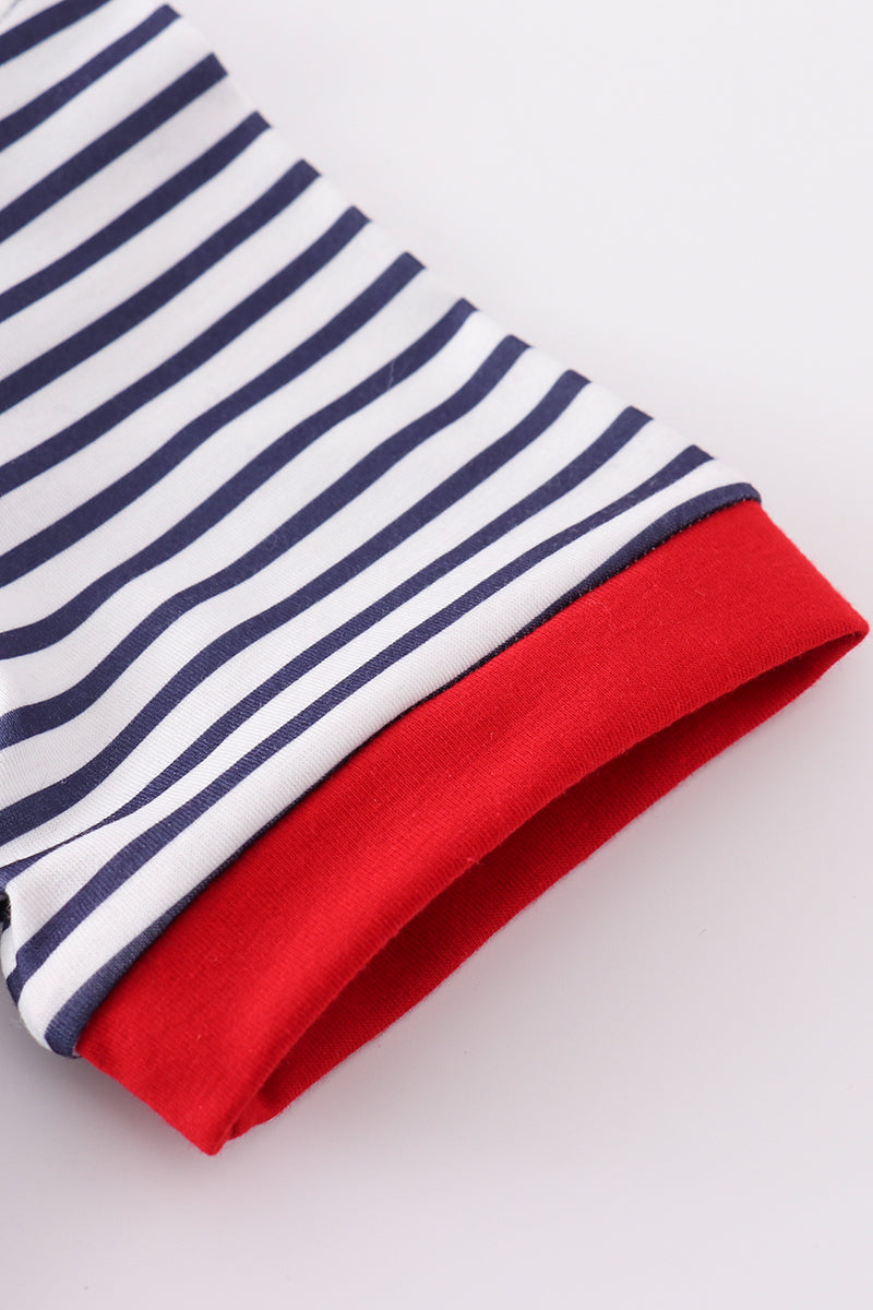 Children's baseball-themed outfit with colorful stripes and playful embroidery.