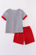 Children's baseball-themed outfit with colorful stripes and playful embroidery.