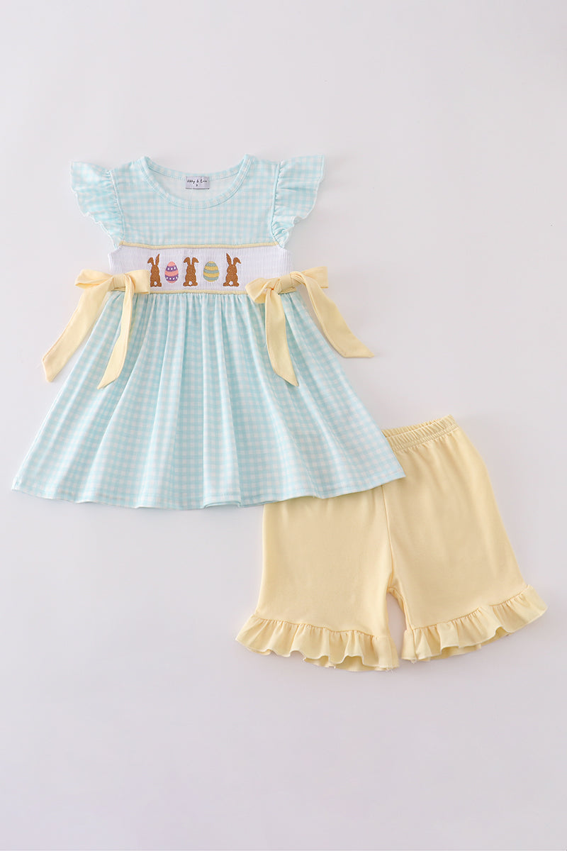 Blue smocked set with cute bunny embroidery, perfect for springtime play.