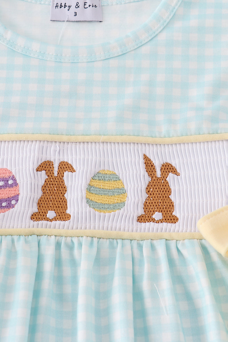 Blue smocked set with cute bunny embroidery, perfect for springtime play.