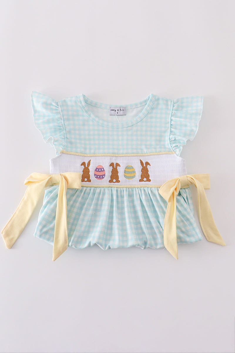 Blue smocked set with cute bunny embroidery, perfect for springtime play.