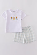 Easter bunny embroidery set with pastel colors on a cozy children's sweater.