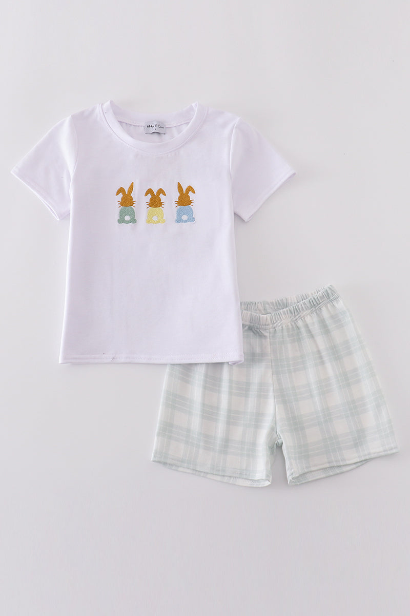 Easter bunny embroidery set with pastel colors on a cozy children's sweater.