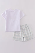 Easter bunny embroidery set with pastel colors on a cozy children's sweater.
