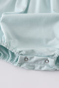 Blue cross embroidery bubble romper with ruffled sleeves, perfect for special occasions.