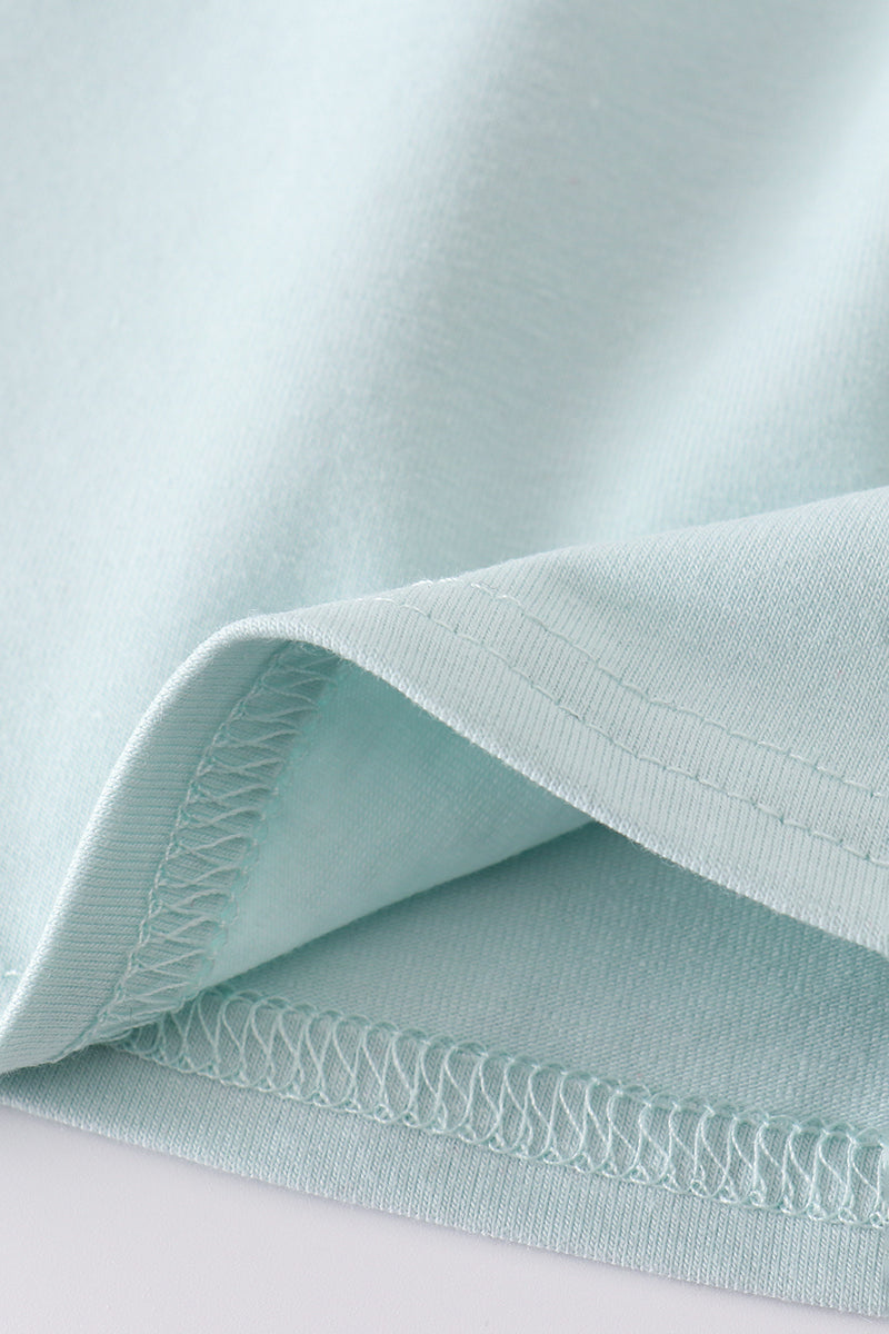 Blue cross embroidery bloomer set with ruffled sleeves, perfect for special occasions.