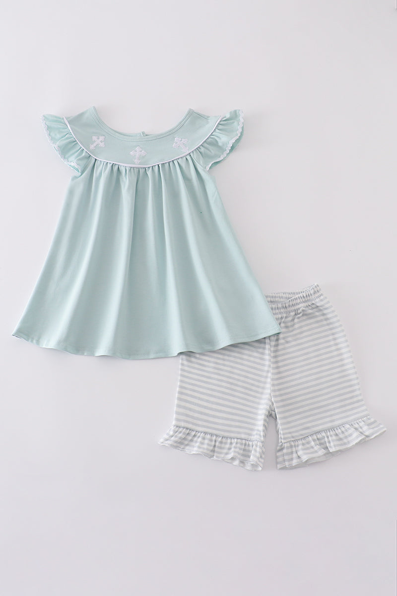 Blue cross embroidery set: cozy children’s outfit with charming cross-stitch pattern.