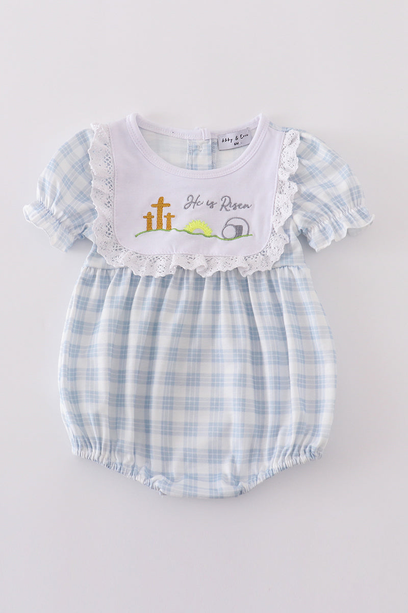 Blue plaid bubble romper with "He is Risen" embroidery, perfect for Easter.