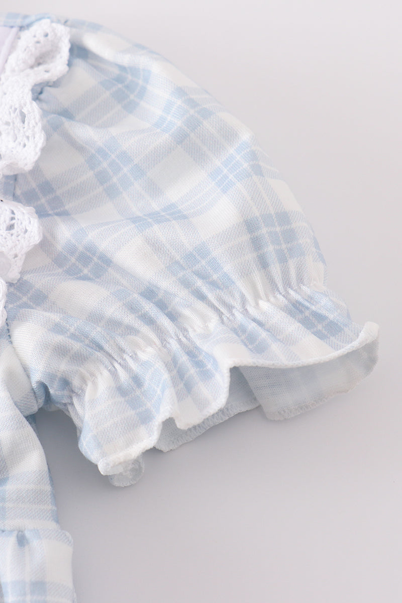 Blue plaid bubble romper with "He is Risen" embroidery, perfect for Easter.