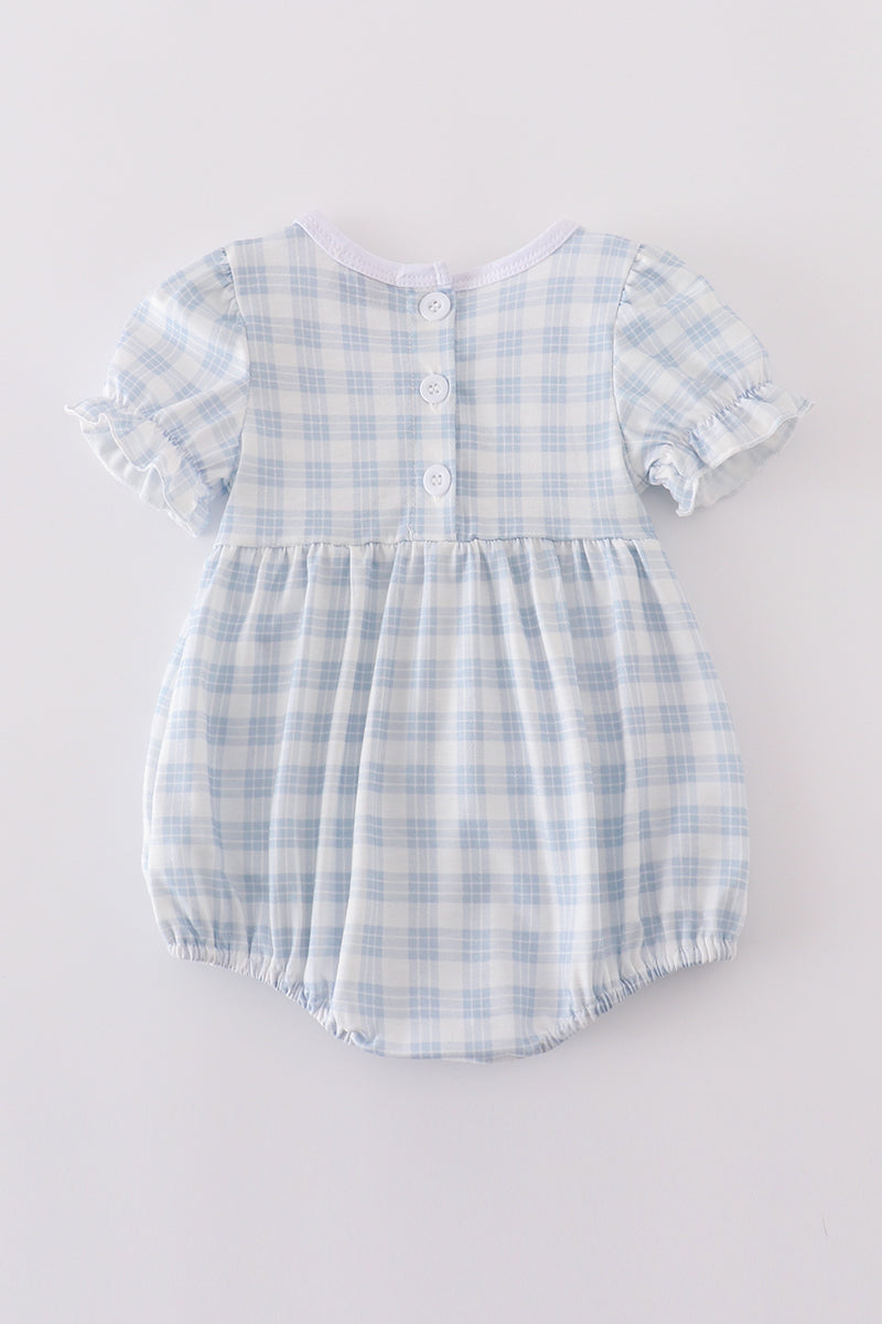 Blue plaid bubble romper with "He is Risen" embroidery, perfect for Easter.