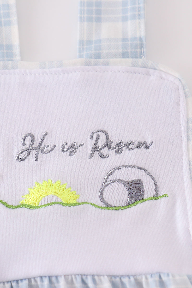 Blue plaid bubble romper with "He is Risen" embroidery, perfect for Easter.