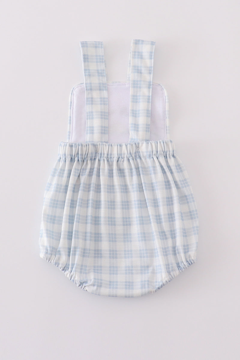 Blue plaid bubble romper with "He is Risen" embroidery, perfect for Easter.