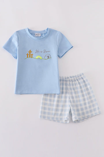 Blue plaid children's outfit with "He is Risen" embroidery, perfect for Easter.