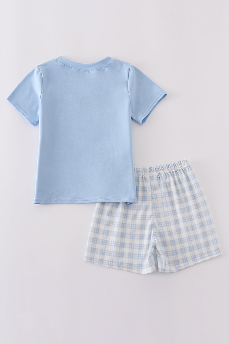 Blue plaid children's outfit with "He is Risen" embroidery, perfect for Easter.