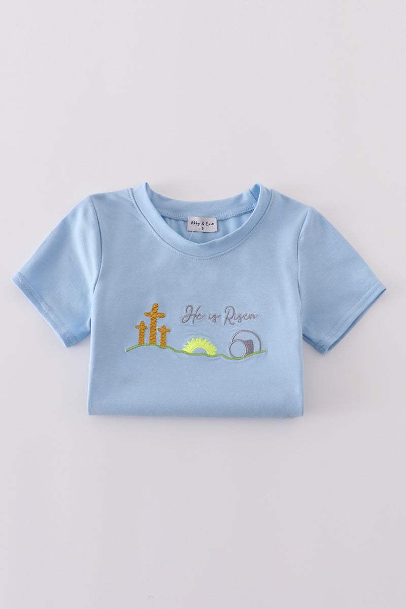 Blue plaid children's outfit with "He is Risen" embroidery, perfect for Easter.