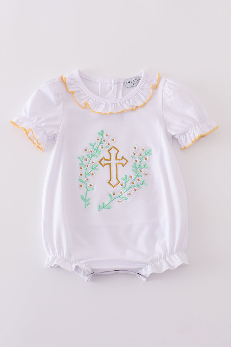 Pastel pink bubble romper with delicate Easter cross embroidery, perfect for spring celebrations.