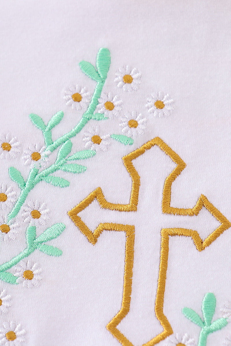 A pastel pink bloomer set with embroidered Easter crosses for girls.