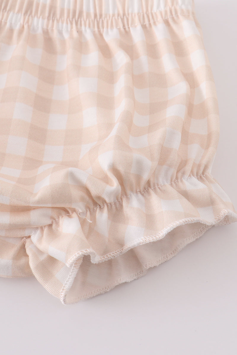 A pastel pink bloomer set with embroidered Easter crosses for girls.
