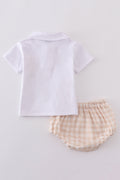 Blue boy bloomer set with Easter cross embroidery, perfect for spring celebrations.