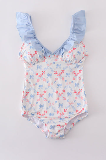 Blue lattice print mom swimsuit with a charming bow detail, perfect for summer.