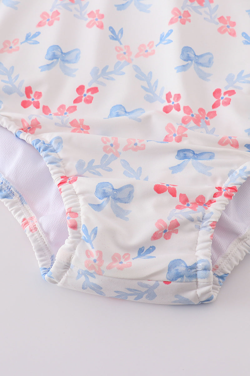 Blue lattice print mom swimsuit with a charming bow detail, perfect for summer.