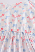 Matching blue lattice print dresses with bows, perfect for mom and daughter outings.
