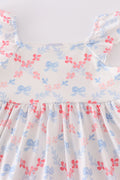 Matching blue lattice print dresses with bows, perfect for mom and daughter outings.