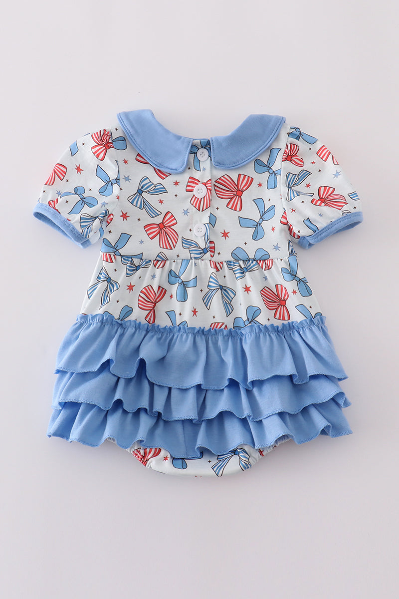 Adorable ruffle bubble with bow trellis print and delicate embroidery.