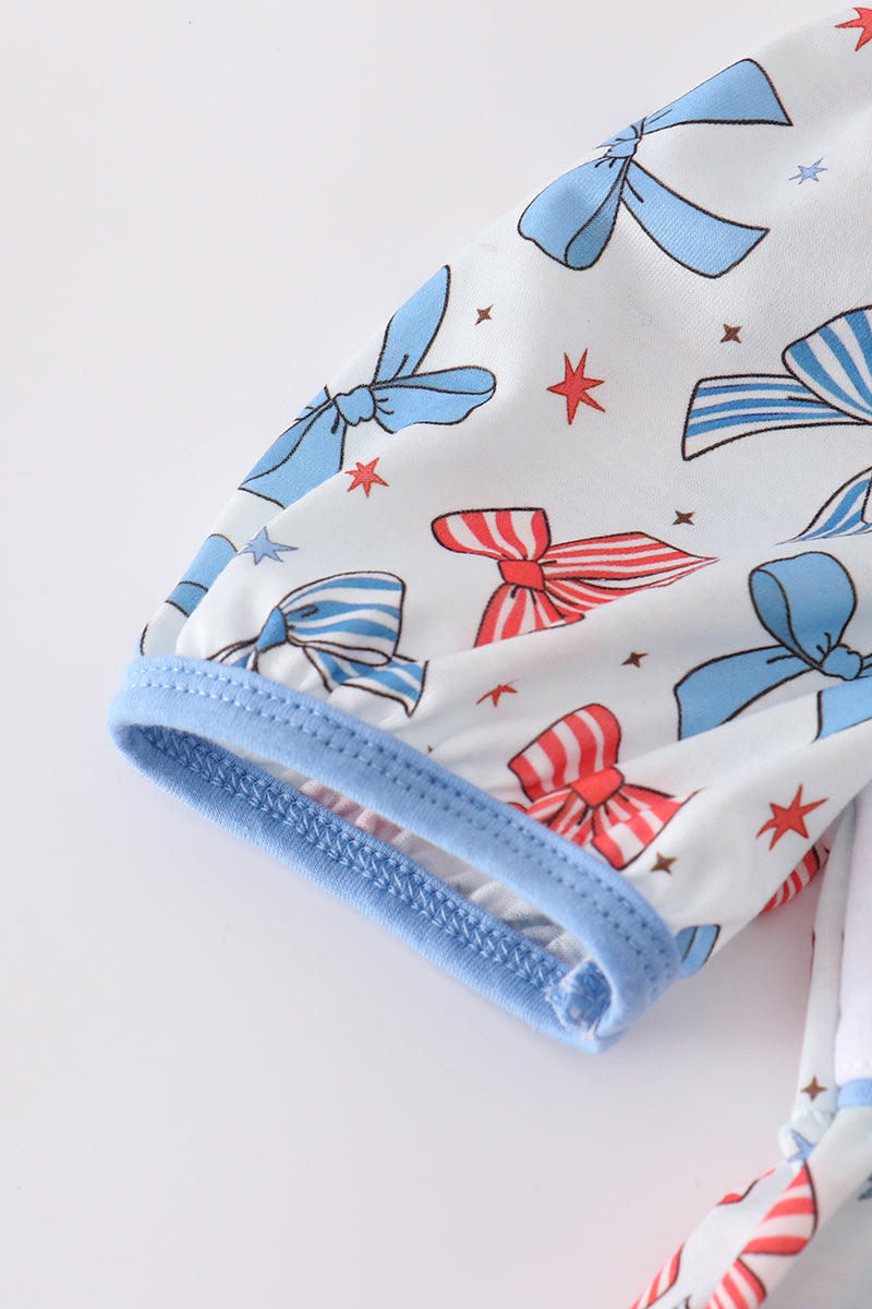 Adorable bow trellis print set with delicate embroidery, perfect for playful adventures.