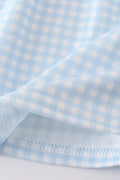 Gingham star embroidery set: blue and white checkered top and shorts with star details.